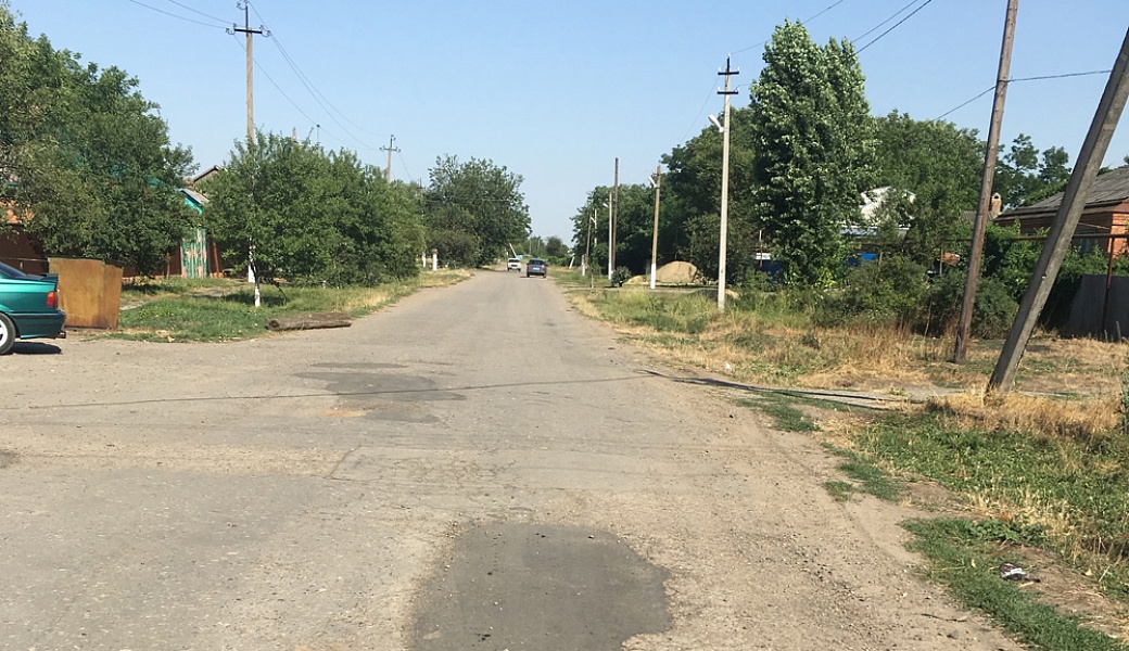 Ремонт автомобильной дороги по улице Ленина села Раздольное